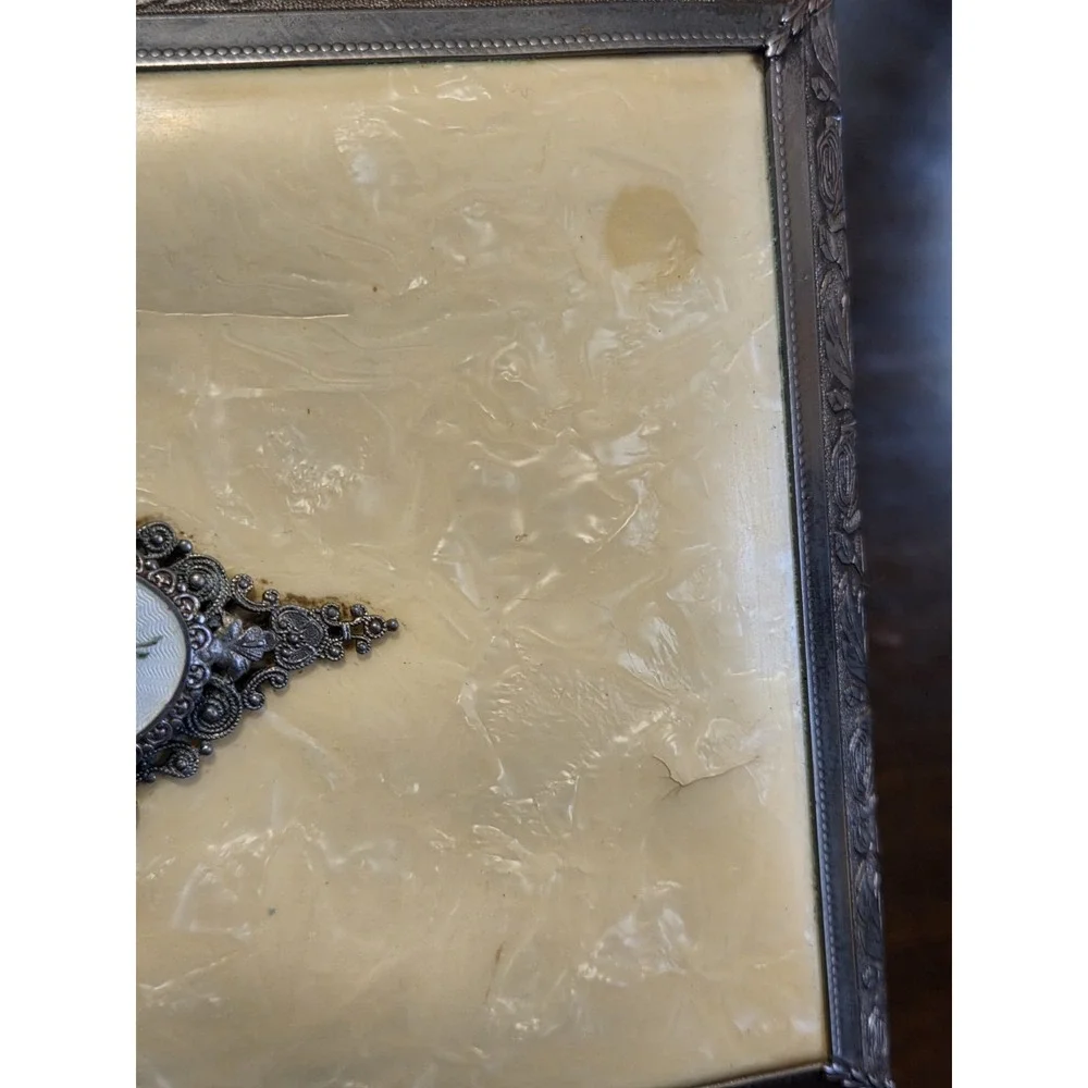 antique etched brass trinket box features a hinged lid Music Box